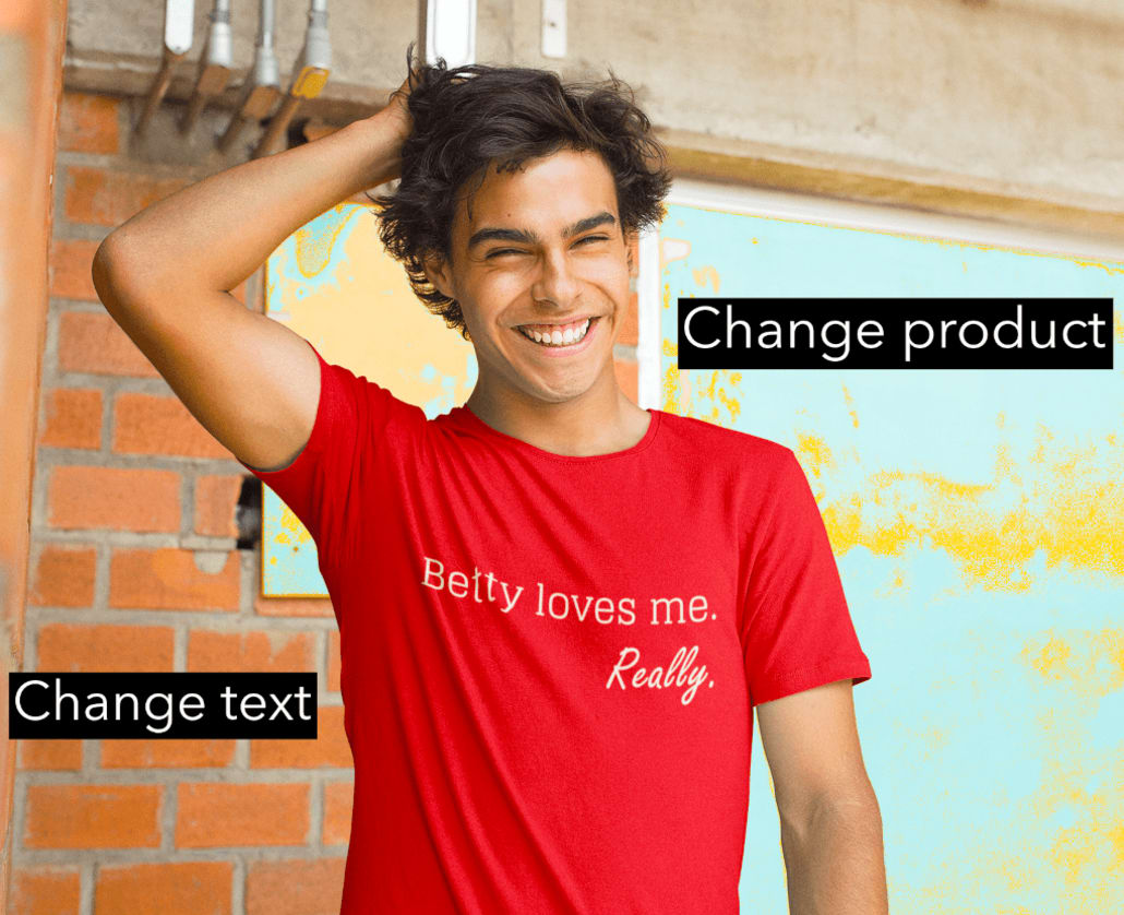 a guy smiling and grabbing his hair